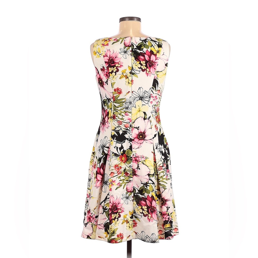 Size 10 woman’s sleeveless A-line dress in floral print.